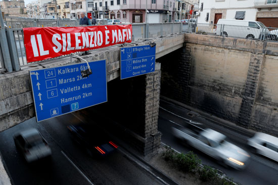 لافتة فى مالطا تتهم الحكومة فى اغتيال صحفية كشفت فساد