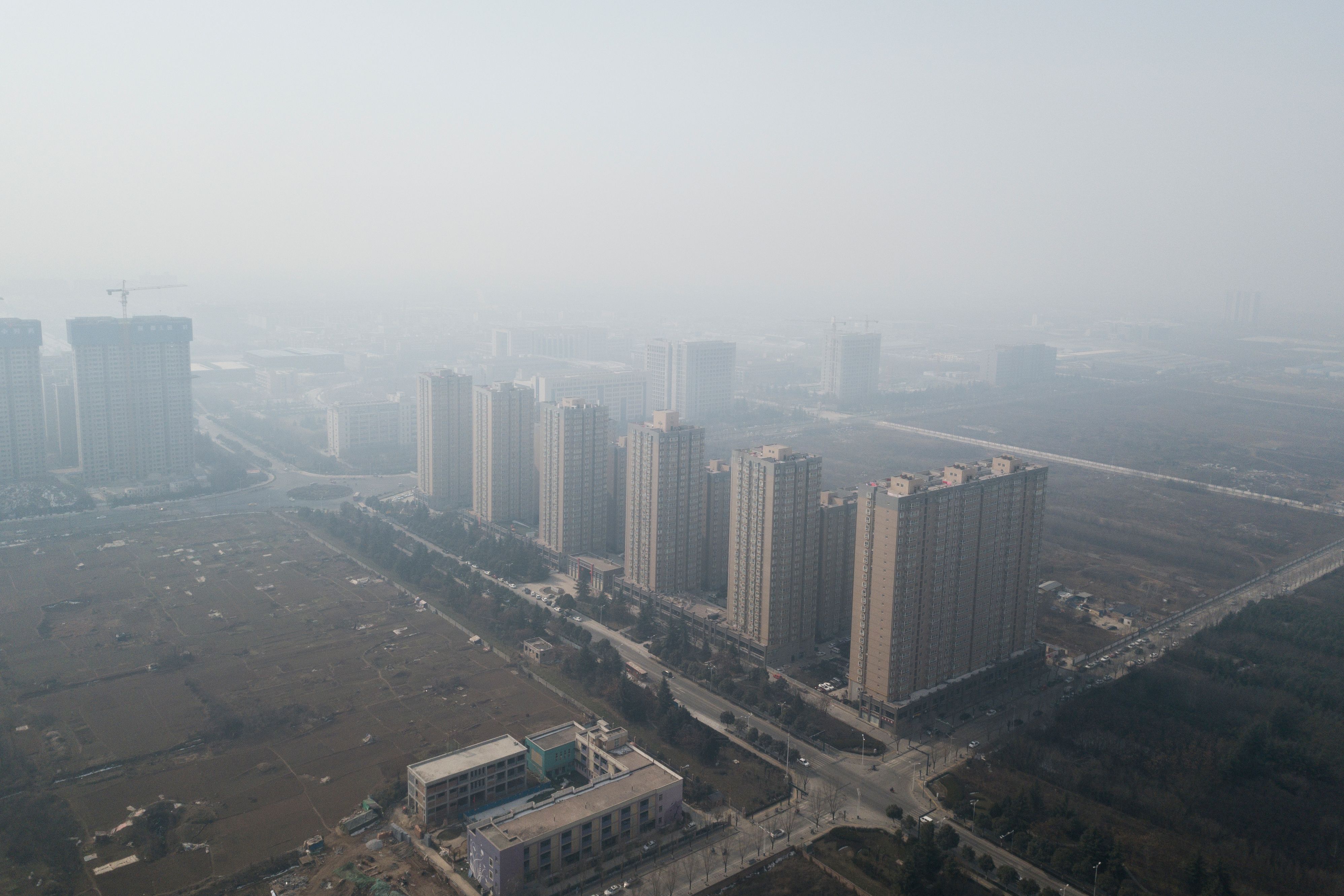 الضباب الدخانى يغطى سماء الصين