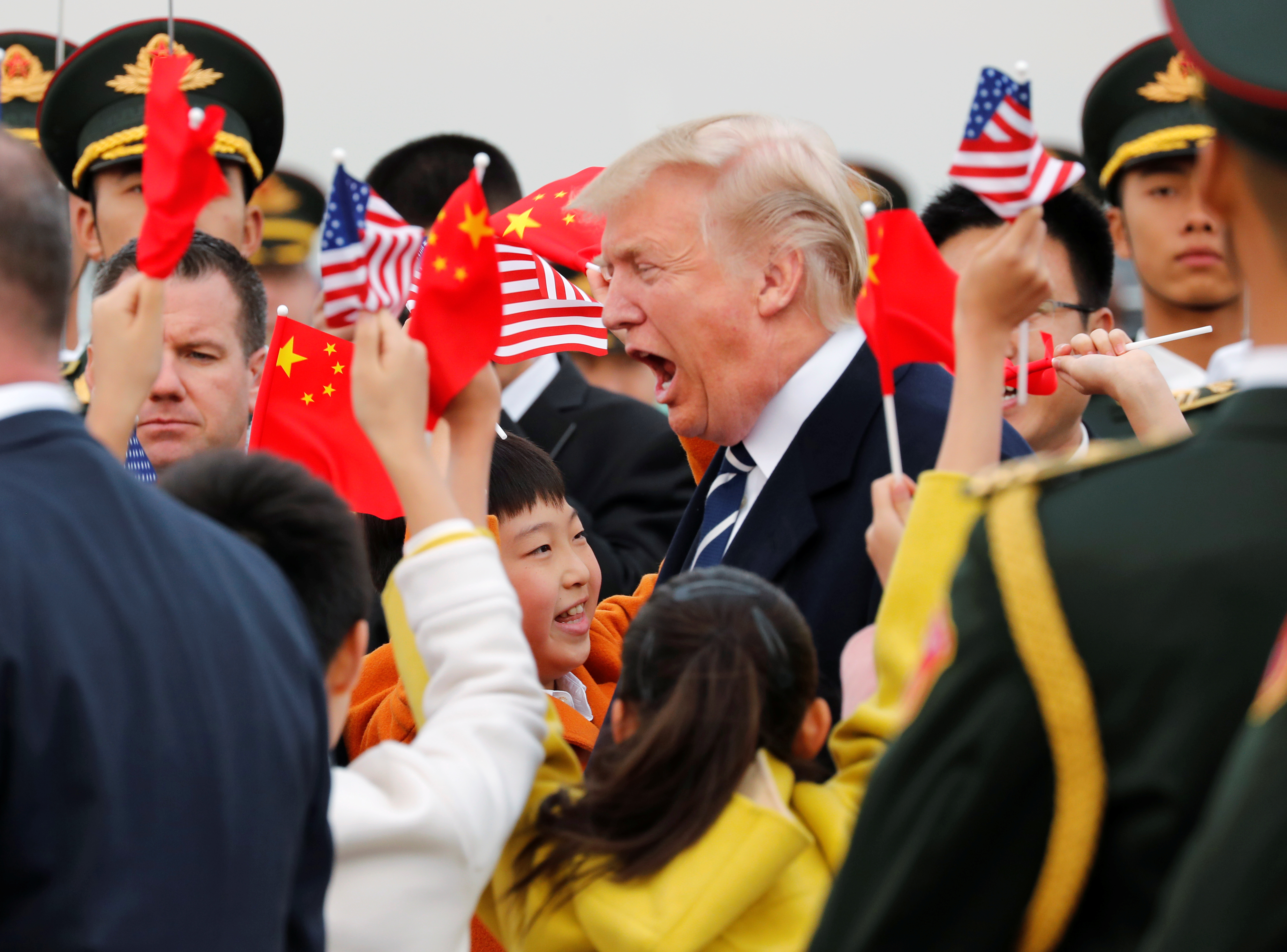 ترامب فى زيارته السابقة للصين قبل أشهر من الحرب التجارية بين واشنطن وبكين