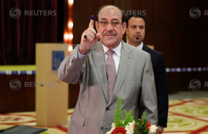 نورى المالكى عقب ادلائه بصوته فى الانتخابات العراقية