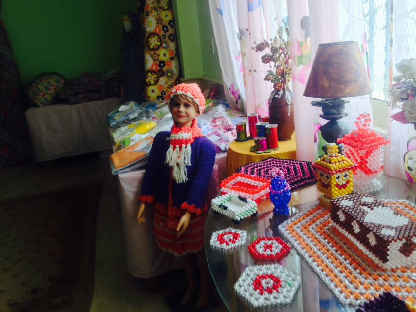 ورش التريكو والخياطة والزخرف من عمل فتيات العجوزة  (2)