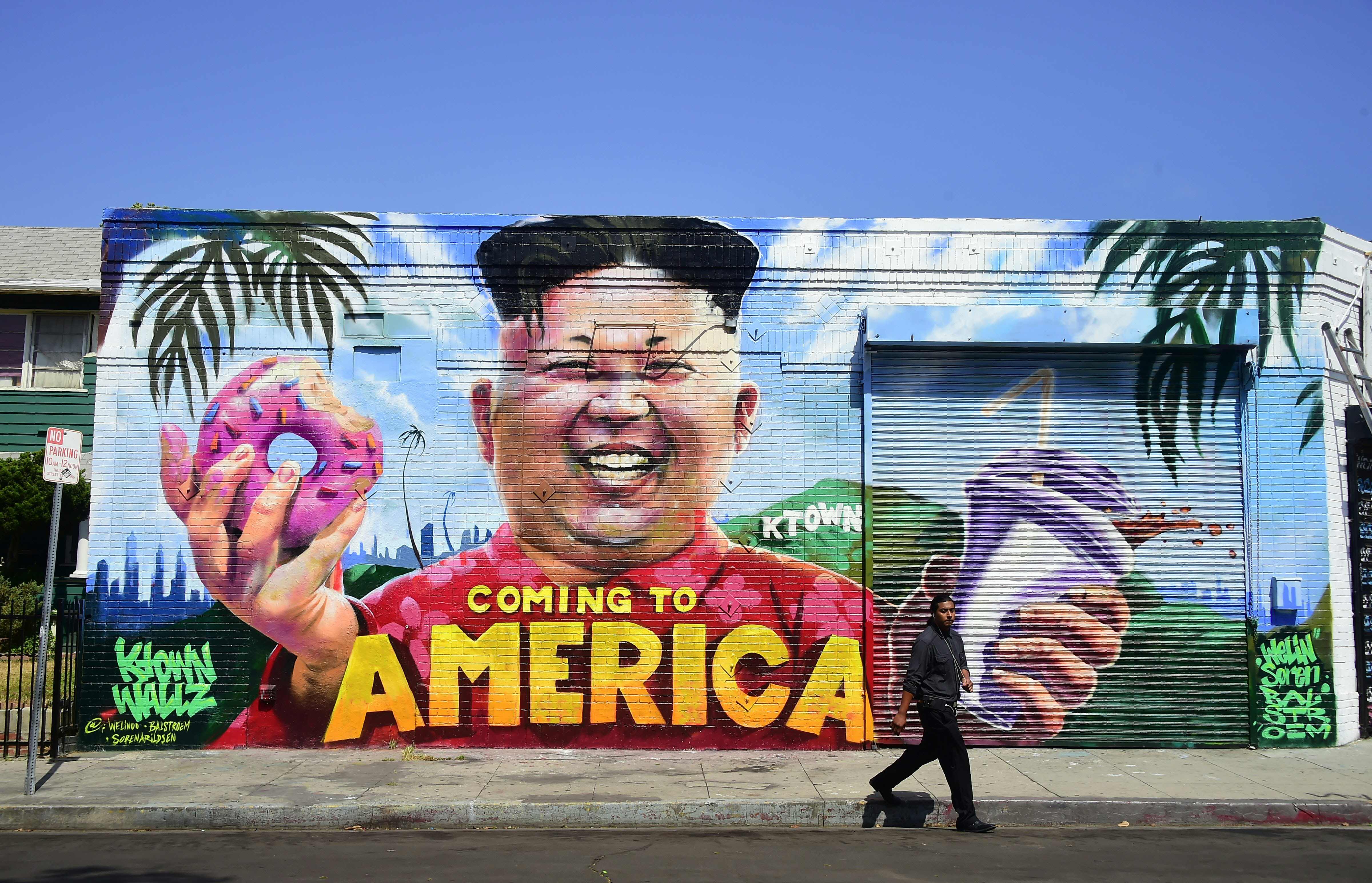 جدارية فنية تجسد زعيم كوريا الشمالية فى رحلة بأمريكا