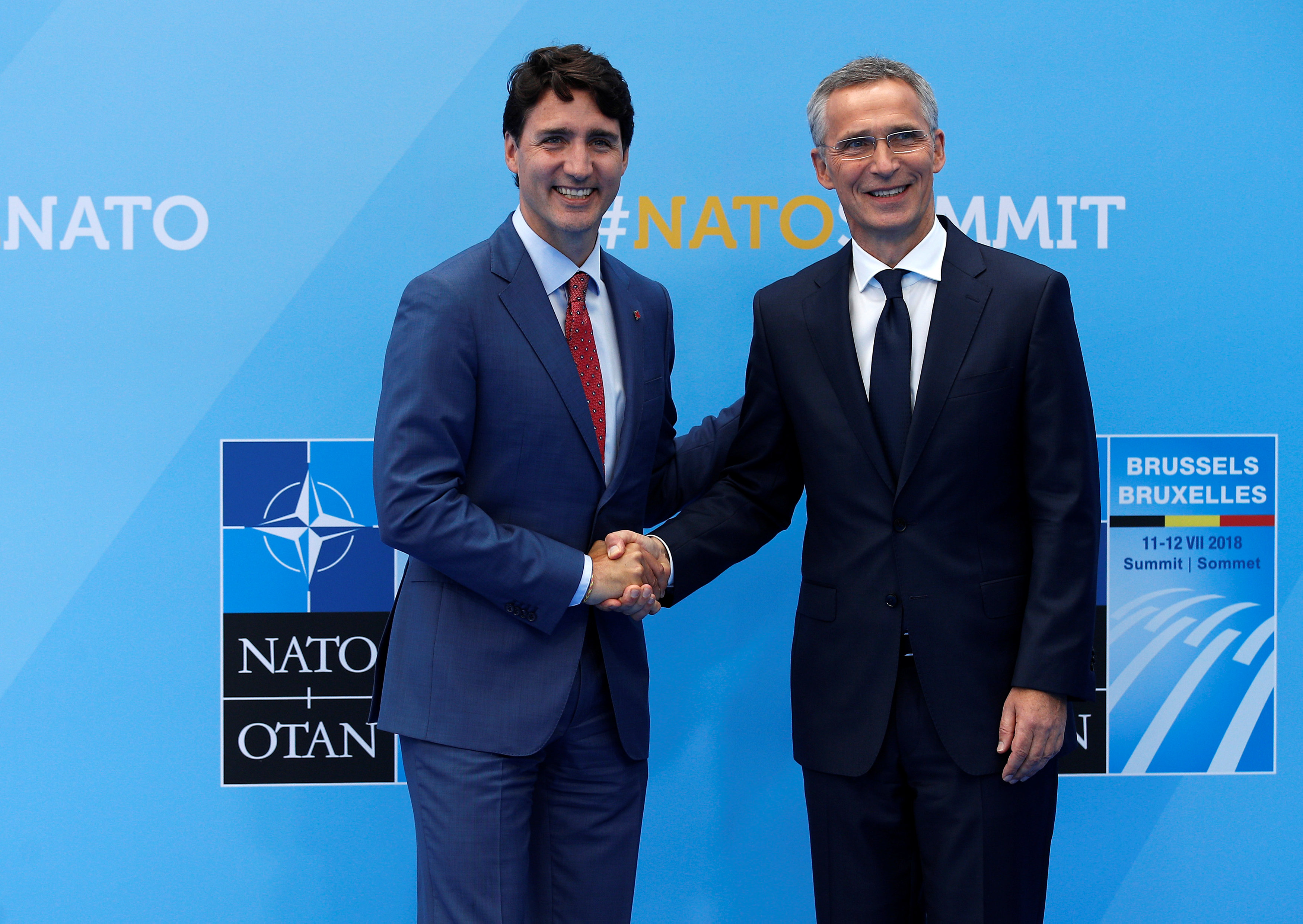 رئيس الوزراء الكندى مع امين عام الناتو