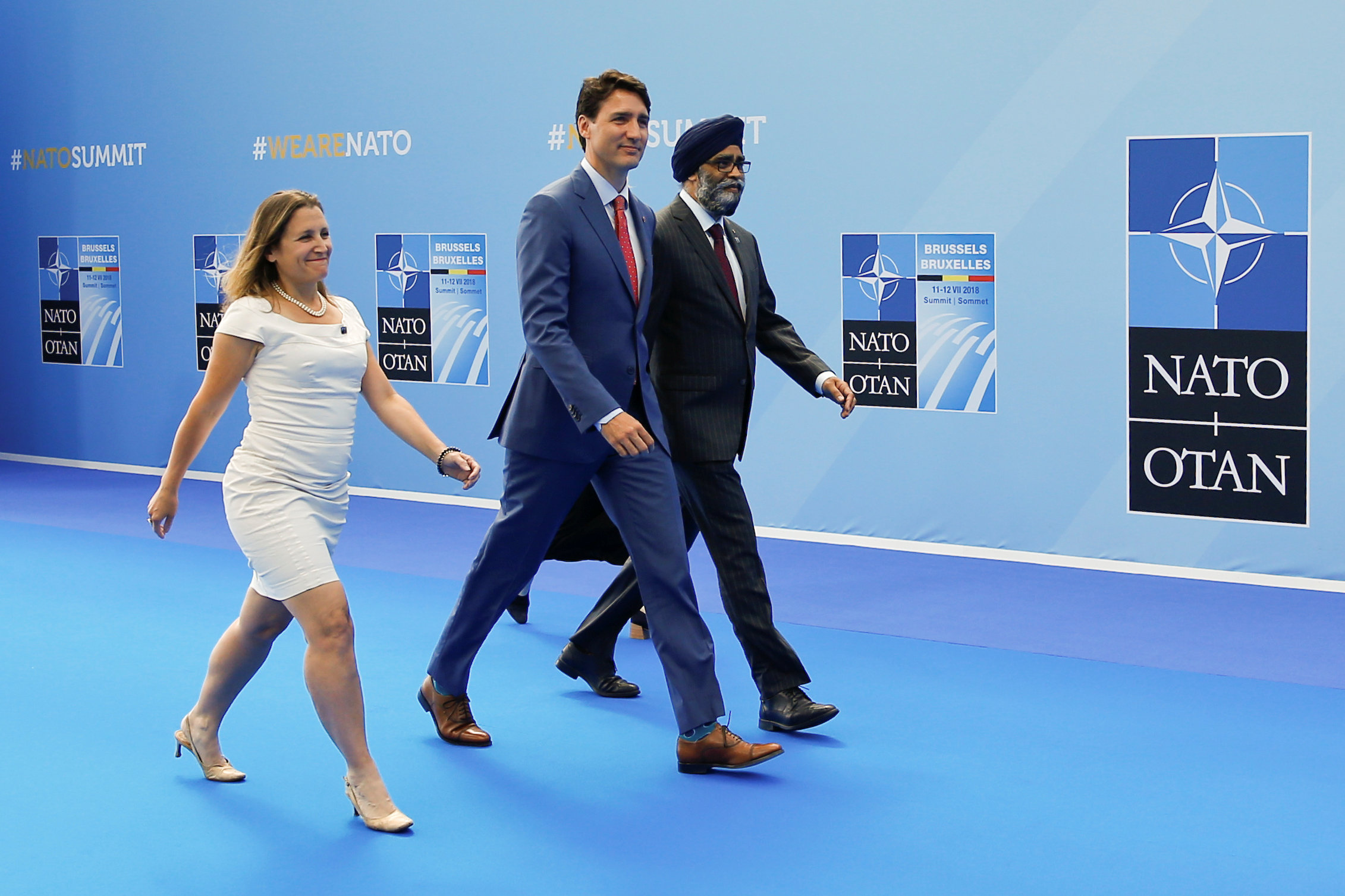 	رئيس وزراء كندا مع وزير دفاعه فى طريقهما لقمة الحلف