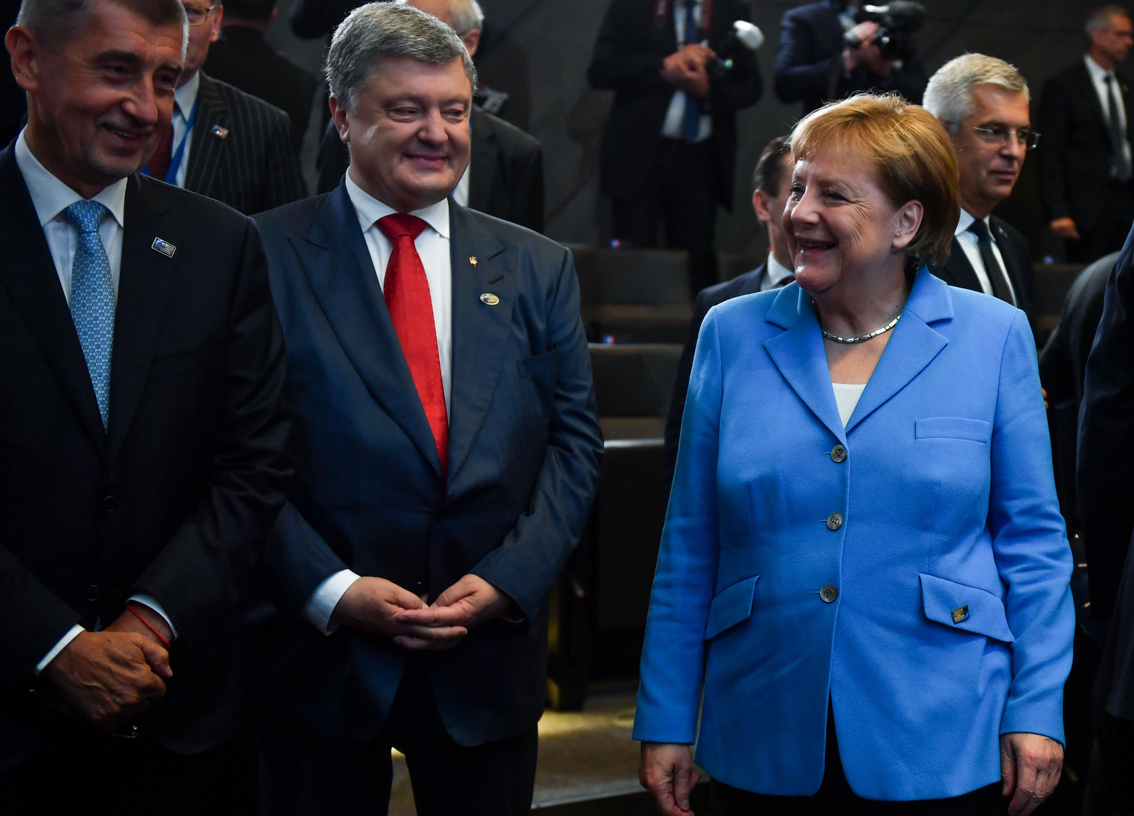 الرئيس الأوكرانى وميركل