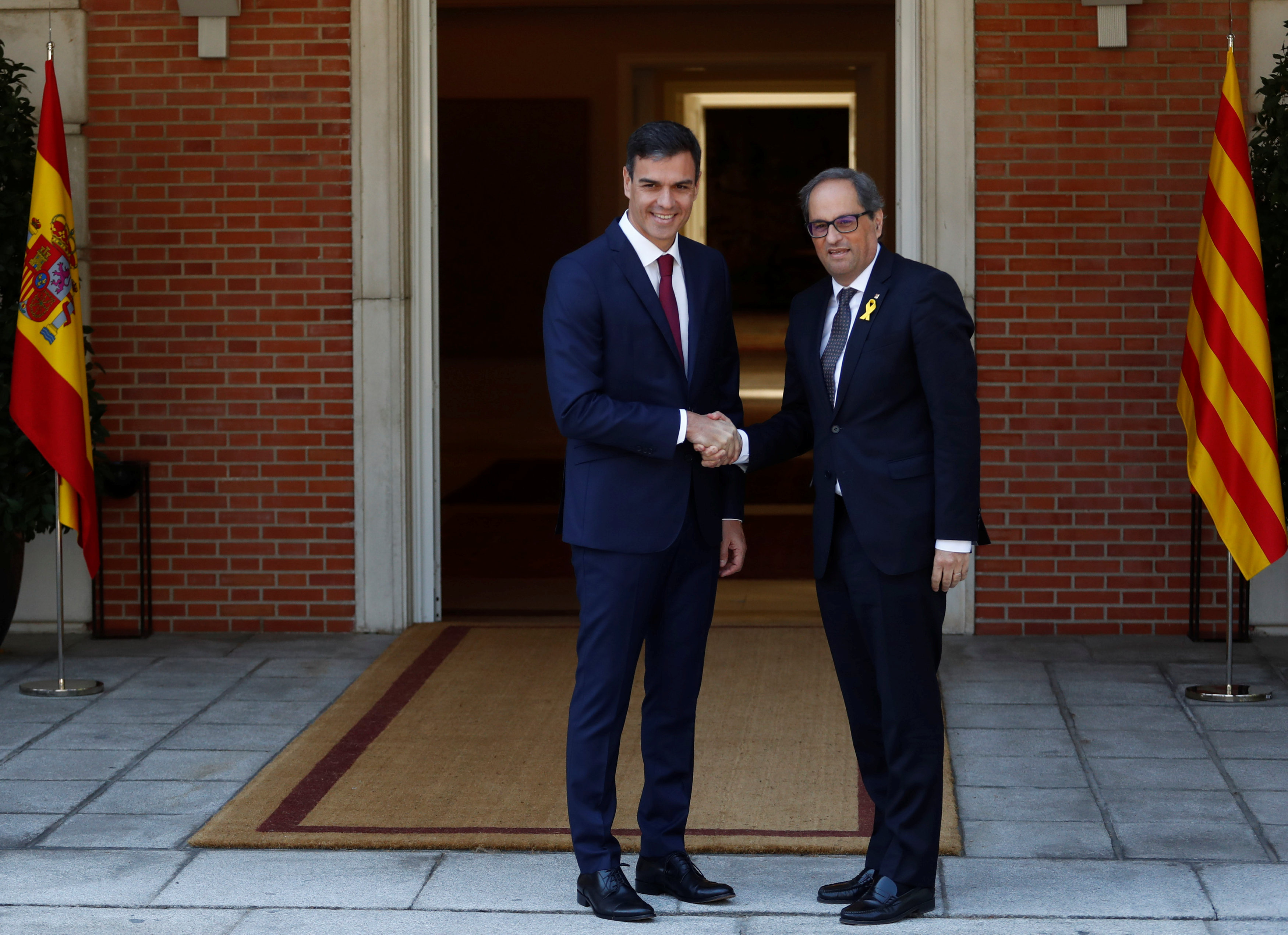لقاء رئيس الوزراء الإسبانى ورئيس إقليم كتالونيا الجديد