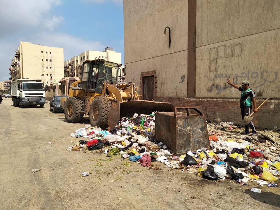 أحياء بورسعيد تواصل أعمال رفع القمامة والمخلفات (5)
