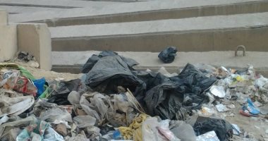 القمامة تحاصر شوارع المعادى