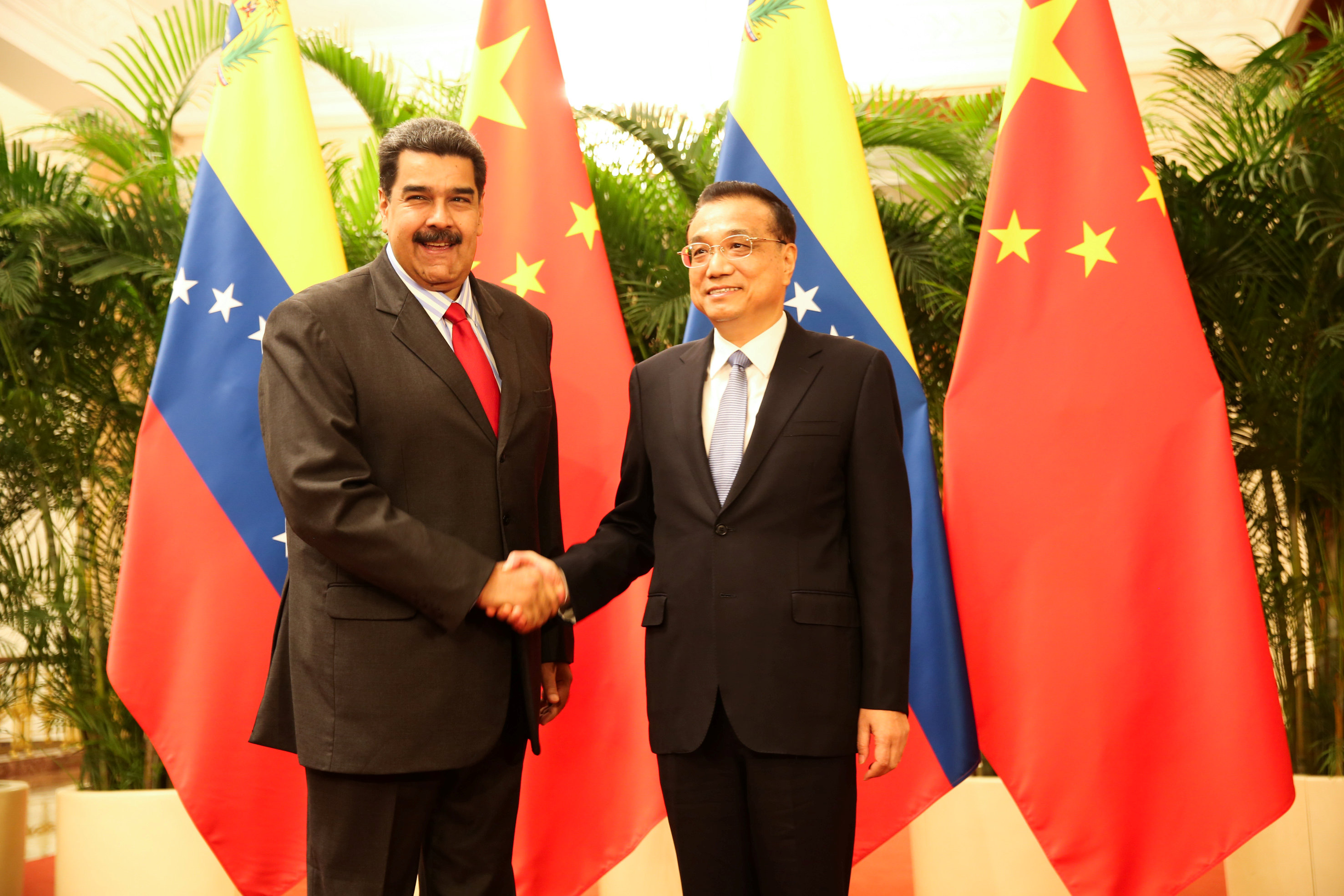 لقاء الرئيس الفنزويلي بمسئول صيني