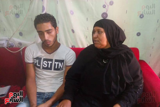 زوجة المجني عليه ونجلها السيد زوجة المجني عليه ونجلها السيد