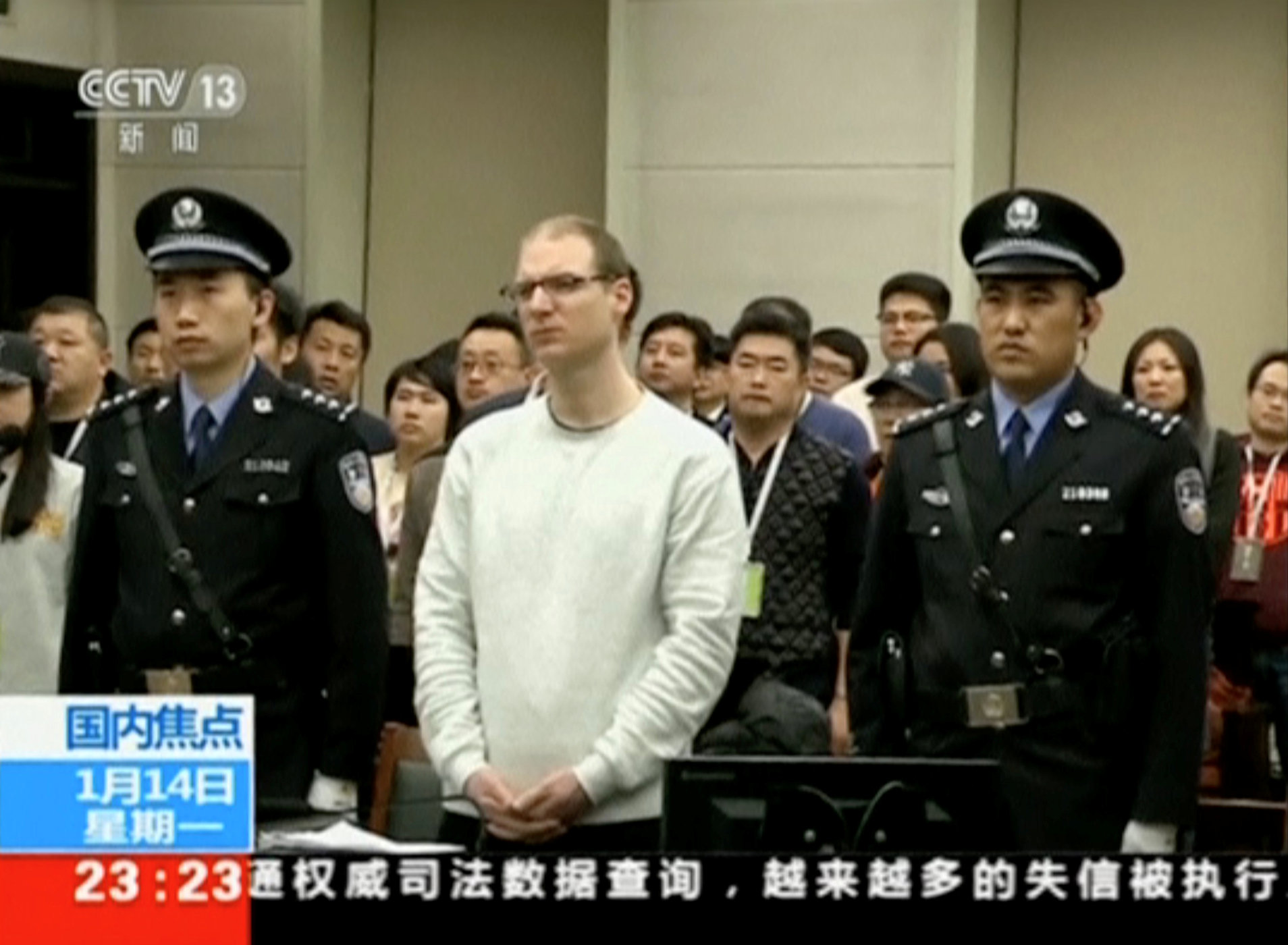محكمة صينية تقضى على كندى بالإعدام  (3)