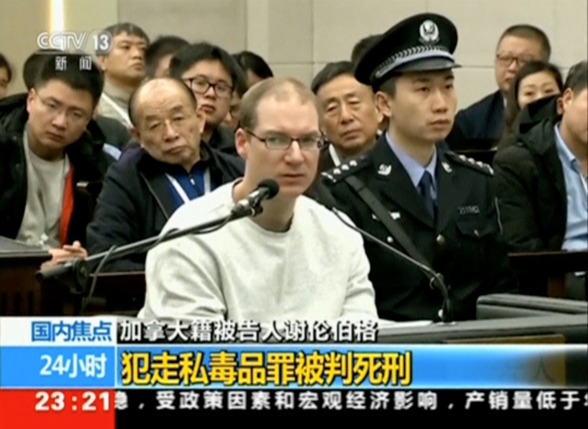 محكمة صينية تقضى على كندى بالإعدام  (2)