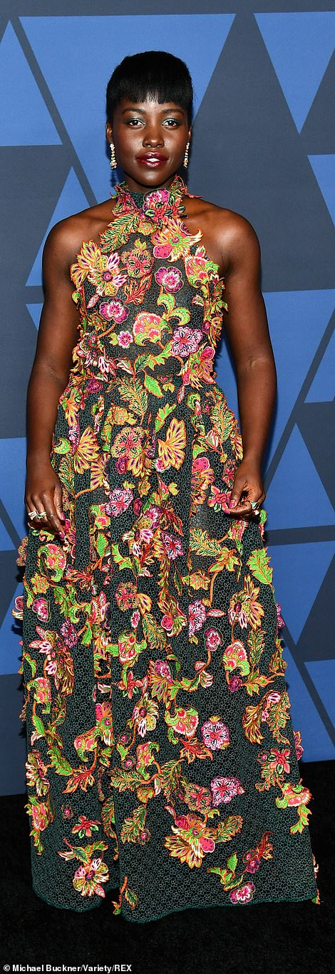 20264476-7620407-In_bloom_Lupita_Nyong_o_s_fashion_taste_flourished_in_a_botanica-a-11_1572255459206