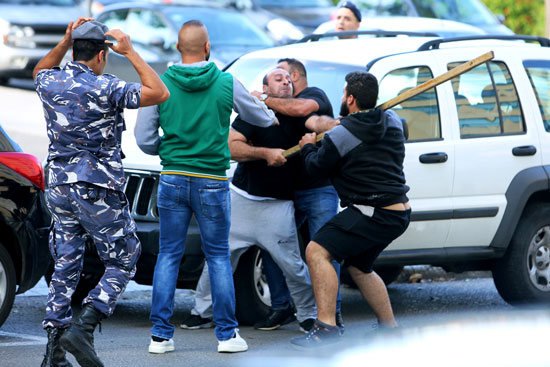 2019-10-29T122947Z_120451079_RC1B18170E50_RTRMADP_3_LEBANON-PROTESTS-SCUFFLE