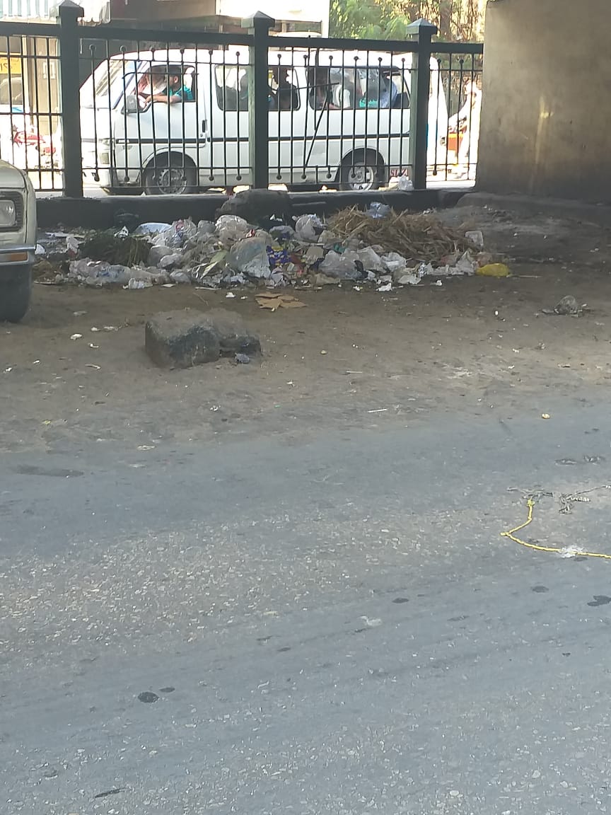 انتشار القمامة بشارع الجيزة الرئيسى