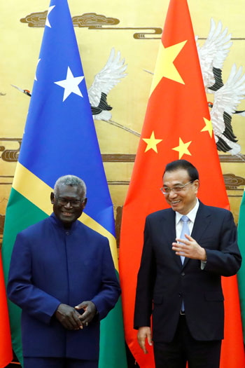 رئيس-وزراء-جزر-سليمان-ورئيس-مجلس-الدولة-الصينى