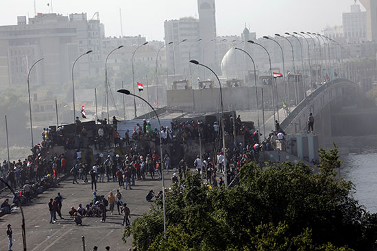 Protesters take control of Al-Sinak Bridge