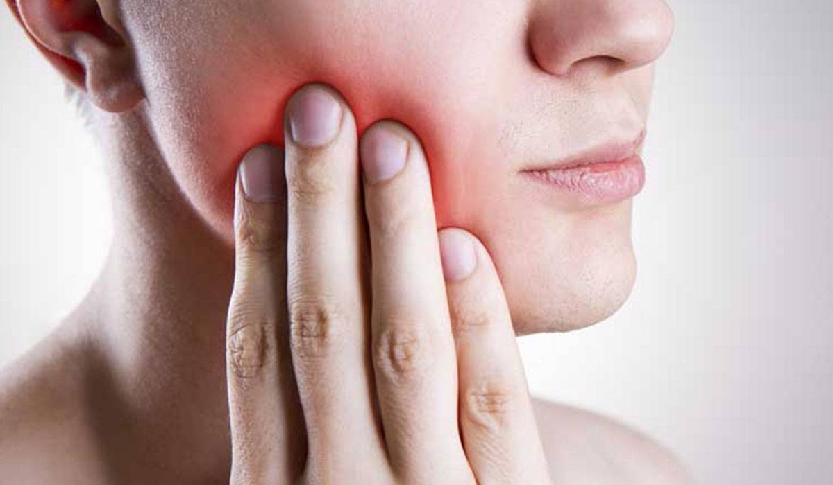 ما هي أعراض الإصابة بخراج الأسنان؟