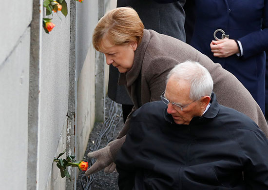 ميركل ورئيس ألمانيا خلال الاحتفالات