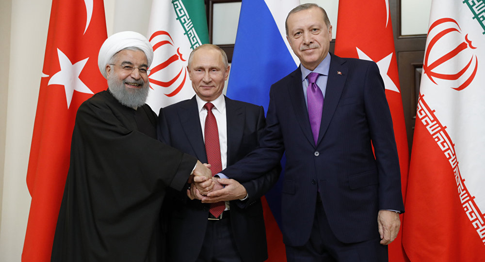 أحد القمم الثلاثية بين بوتين وروحانى وأردوغان