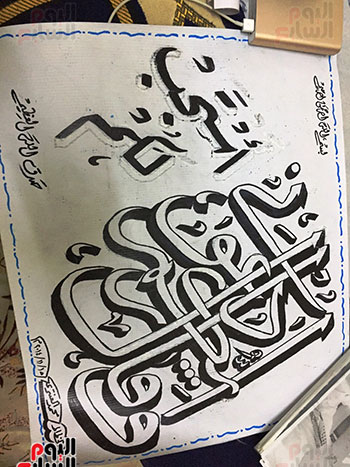 مواطن يكتب المصحف الشريف بخط يده فى المحلة (15)