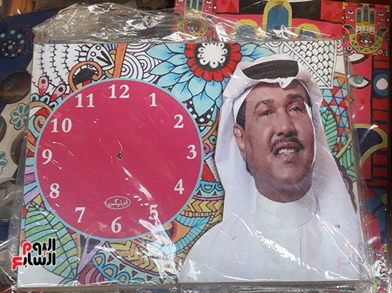 ساعة-بصورة-محمد-عبده