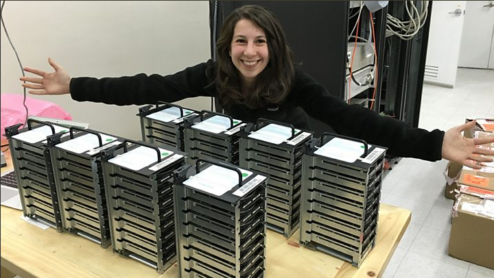 Katie Bouman alongside the data that got us to the black hole