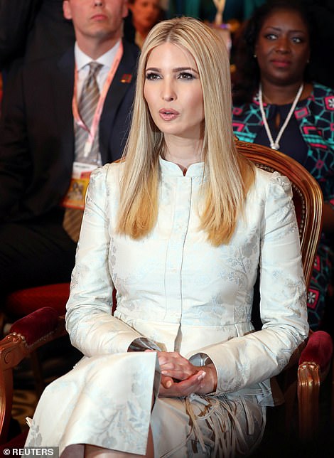 12399854-6933847-Outfit_Ivanka_opted_to_wear_a_skirt_suit_featuring_a_peplum_jack-a-130_1555537005034