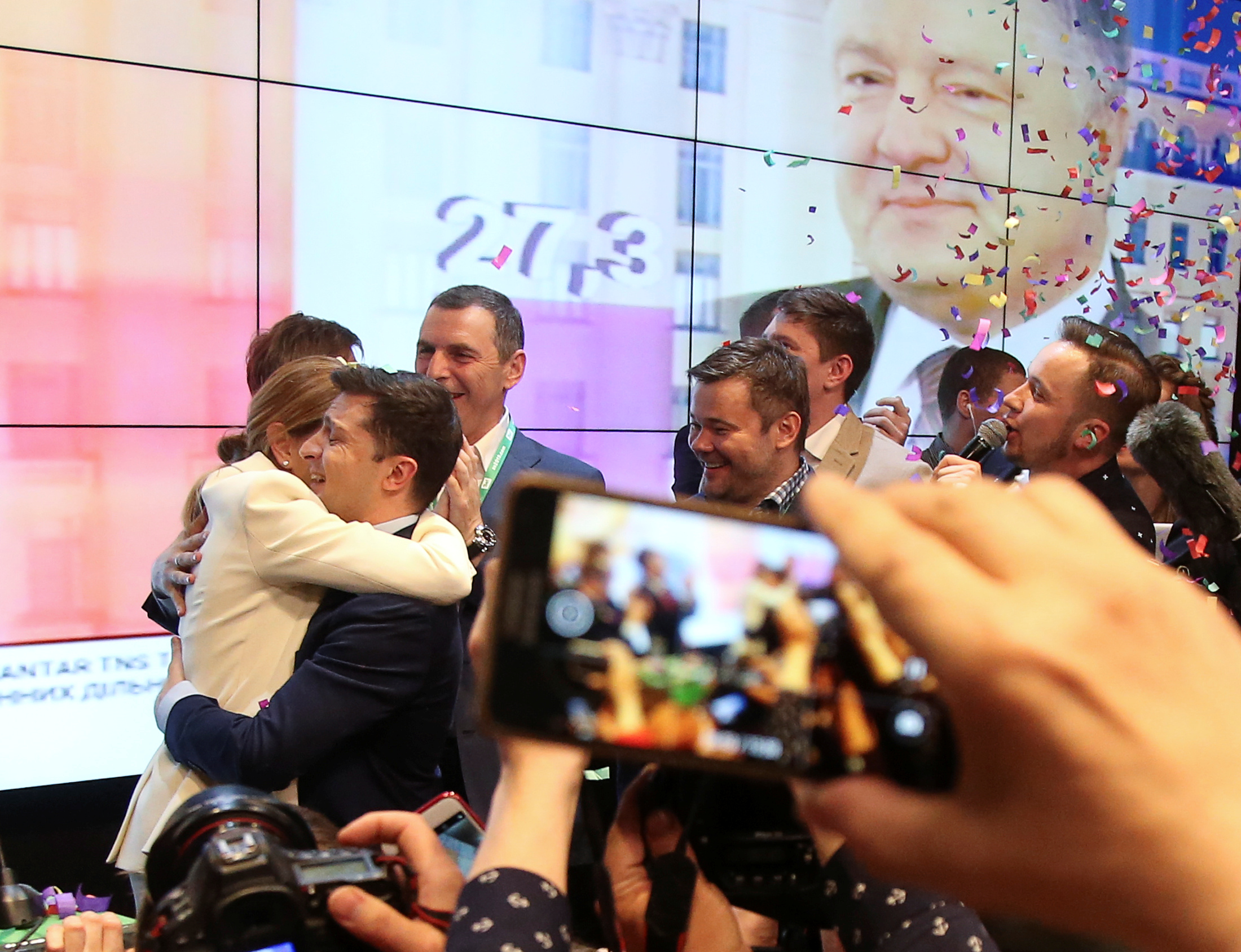 Volodymyr Zelensky embraces his wife