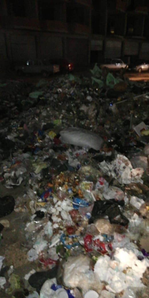 أكوام القمامة بشارع التروللى