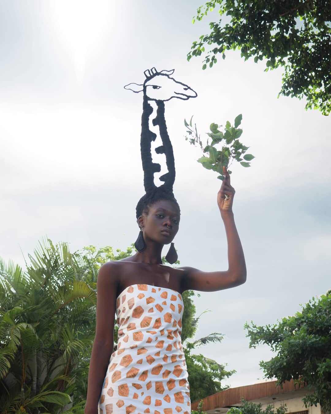 ivory-coast-artist-builds-powerful-sculptures-from-her-hair-04
