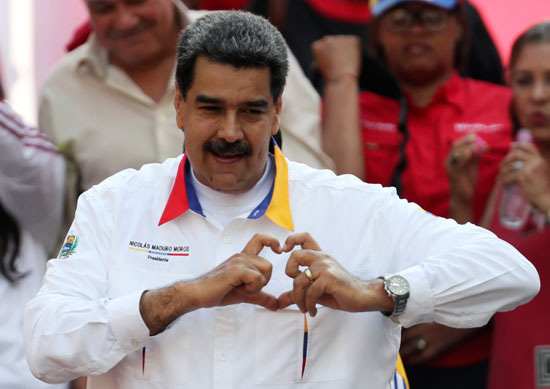 احتفالات بالذكرى السنوية الأولى لإعادة انتخاب مادورو رئيسا لفنزويلا (10)