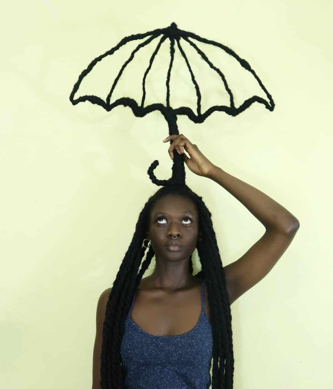 ivory-coast-artist-builds-powerful-sculptures-from-her-hair-09