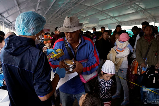 2019-06-13T193814Z_1500253936_RC1F34D3E920_RTRMADP_3_VENEZUELA-MIGRATION-ECUADOR