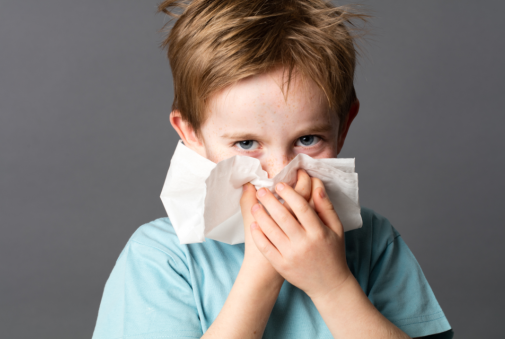 kid-using-tissue-nose-505x339