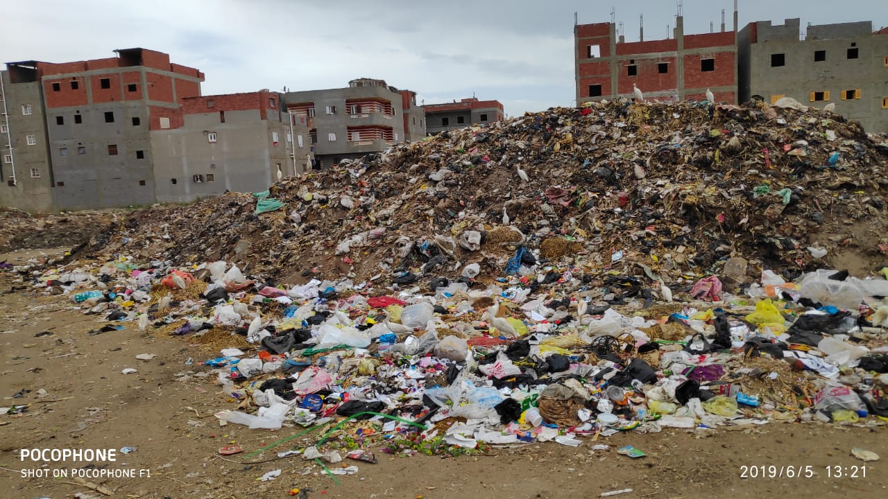 Garbage at the village entrance Garbage at the village entrance
