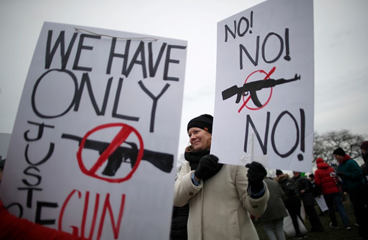 مظاهرات تطالب بتقنين حيازة السلاح فى أمريكا