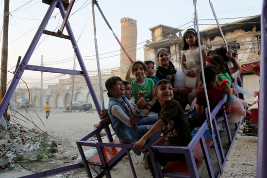 الأطفال-يحتفلون-بالعيد-فى-العراق
