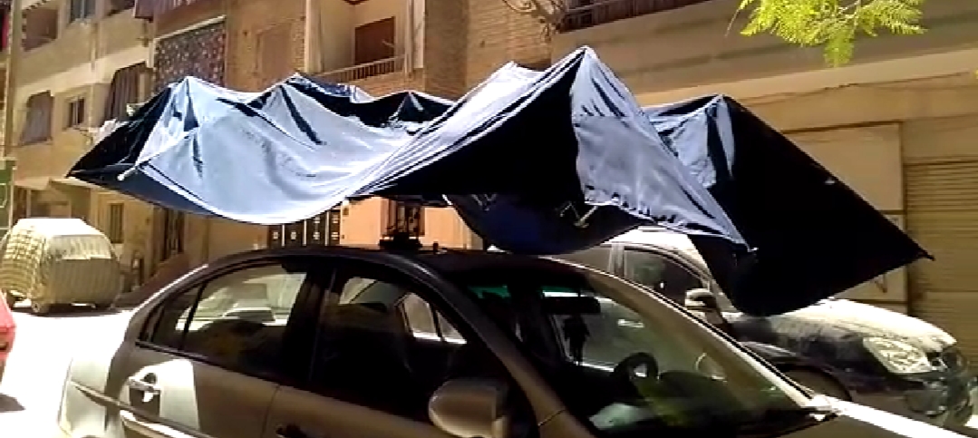 مظلة ذاتية بالريموت لوقاية السيارات من الشمس