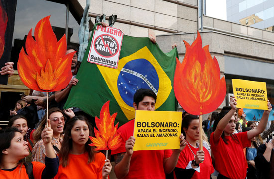 2019-08-23T230933Z_1127053643_RC185DC8CD70_RTRMADP_3_BRAZIL-ENVIRONMENT-PROTESTS-CHILE