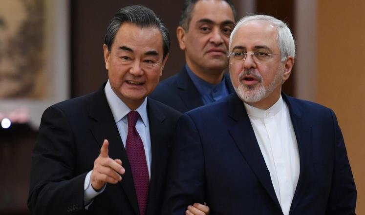 وزير الخارجية الإيرانى بجوار نظيره الصينى
