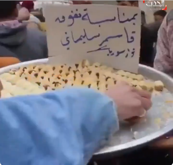 توزيع حلوى فى شوارع ادلب