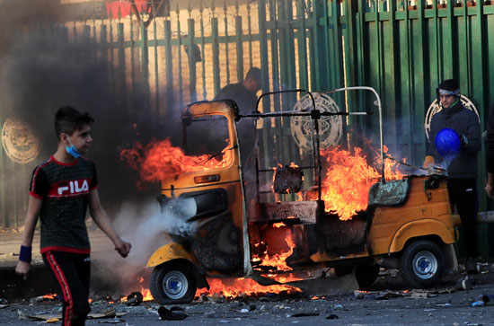 اضرام النار فى شوارع بغداد