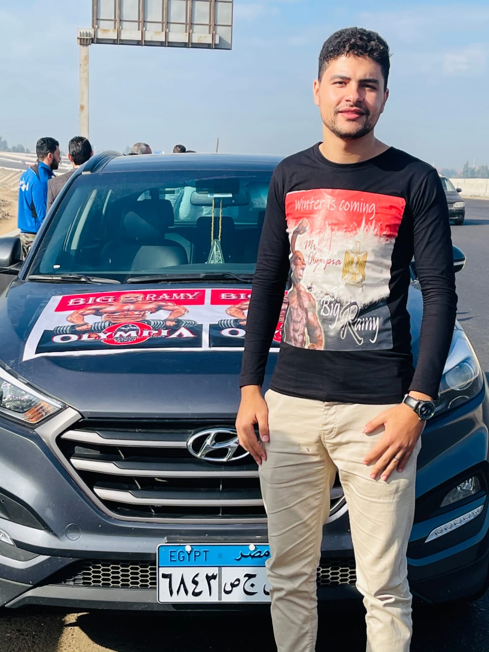 A march in cars and shawls wearing a T-shirt with a photo of Rami Al-Subaie to receive him (9)