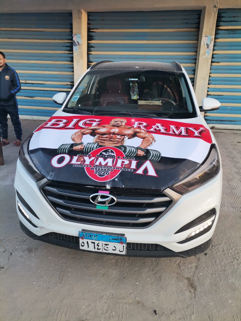 A march in cars and a guy, with a T-shirt with a photo of Rami Al-Subaie, to greet him (12)