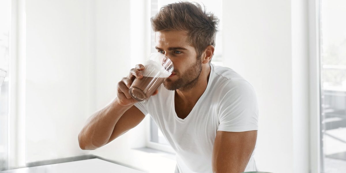 man-drinking-chocolate-milk-muscle-recovery-foods1-1200x600