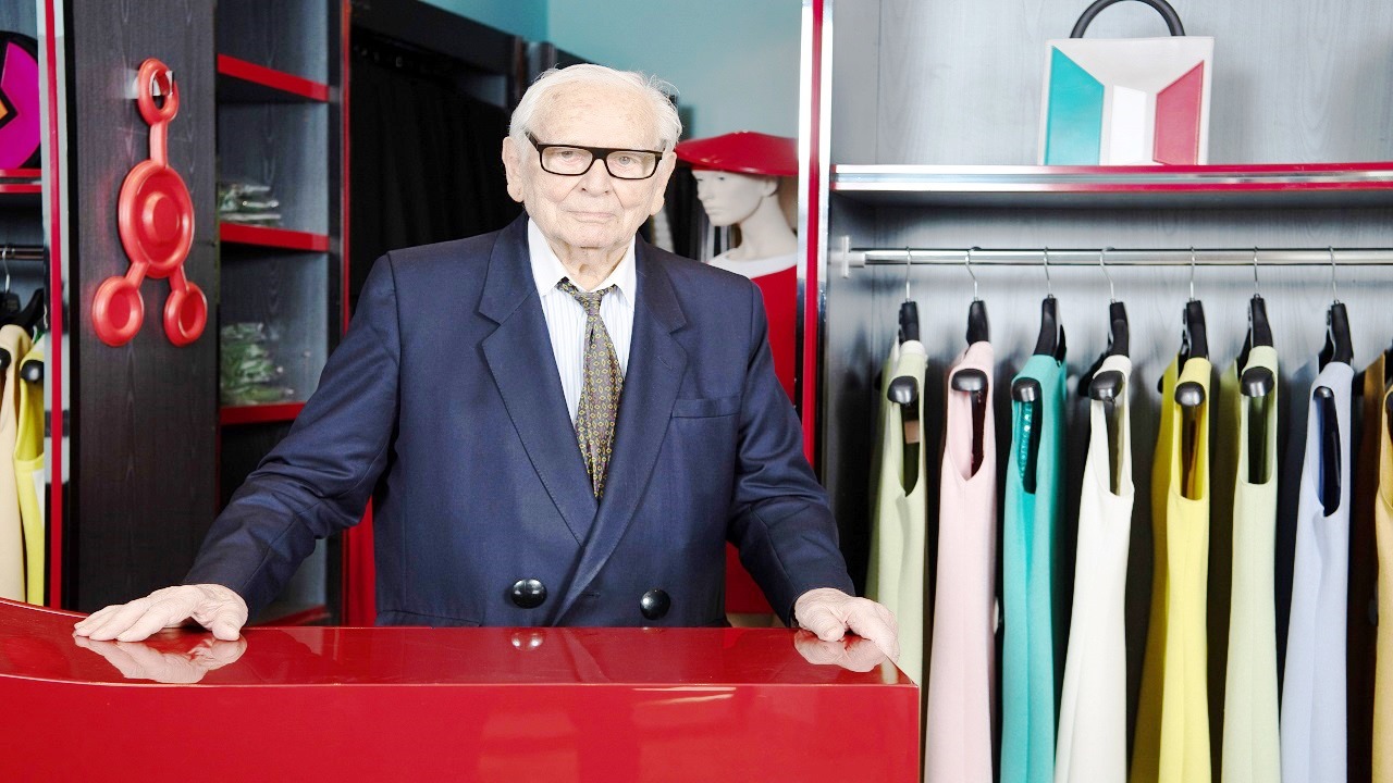 Pierre Cardin with his designs