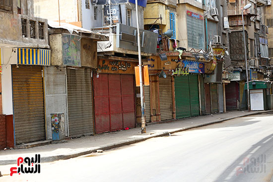غلق المحلات فى شارع بورسعيد تطبيقا لقرار الحكومه (9)
