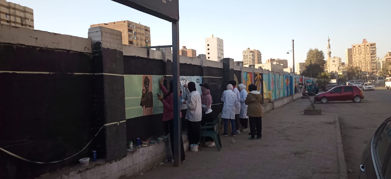شباب محافظة الجيزة يزنون أسوار الشوارع بلوحات فنية (7)