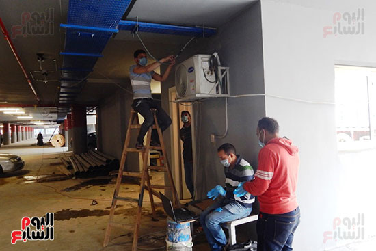 عمال مشروعات ميناء الإسكندرية يلتزمون بالإجراءات الوقائية (4)